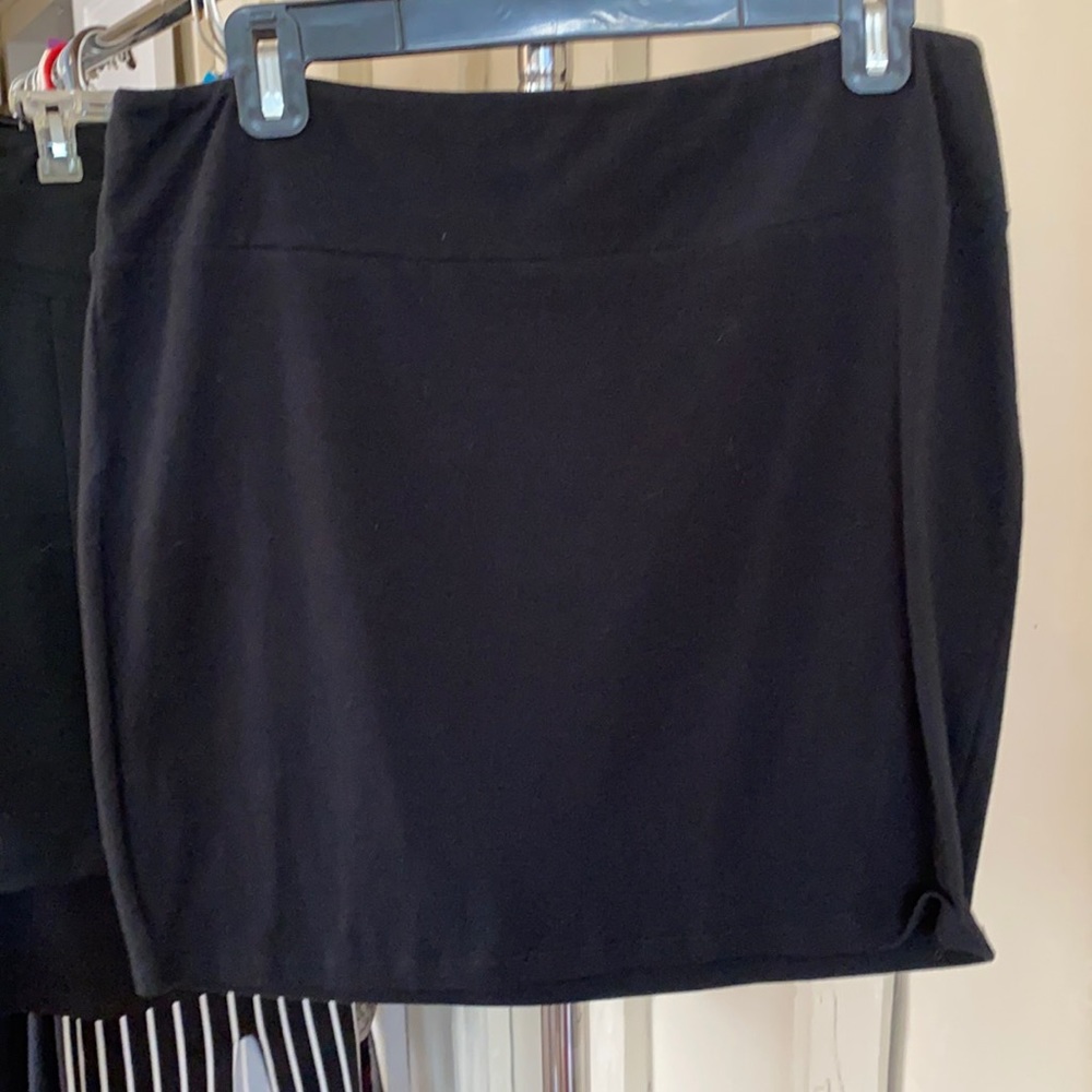 17” inch shirt black skirt.